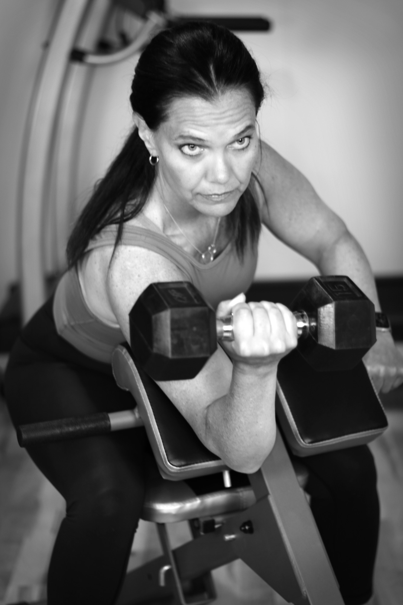 Anita strength training with a dumbbell